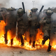 Illustration for article titled These Photos Of Soldiers Executing Fire Phobia Training Will Terrify You